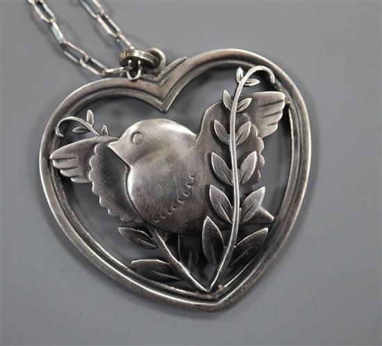 A Georg Jensen sterling robin and wheatsheaf heart shaped pendant, no. 97, on fine link chain, 40mm.